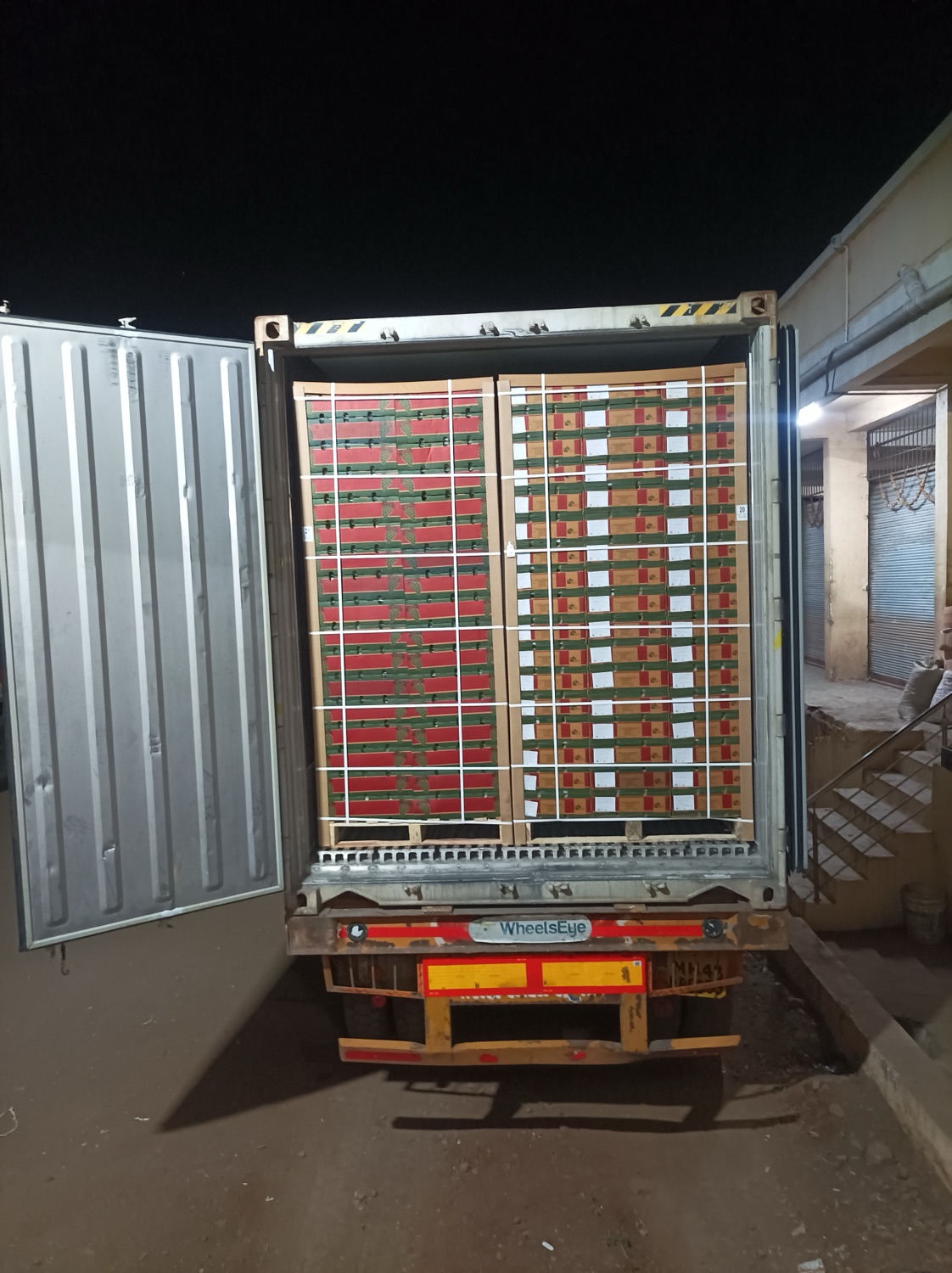 Grape cartons staged for an overnight dispatch.
